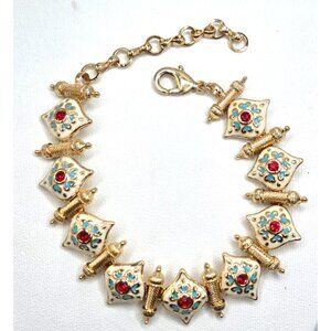 Gold Tone Bracelet With Enamel & Red Rhinestone Accents